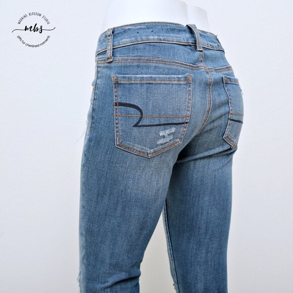 American Eagle Super Stretch Low Waist Distressed Raw Hem Jeggings - Picture 12 of 14
